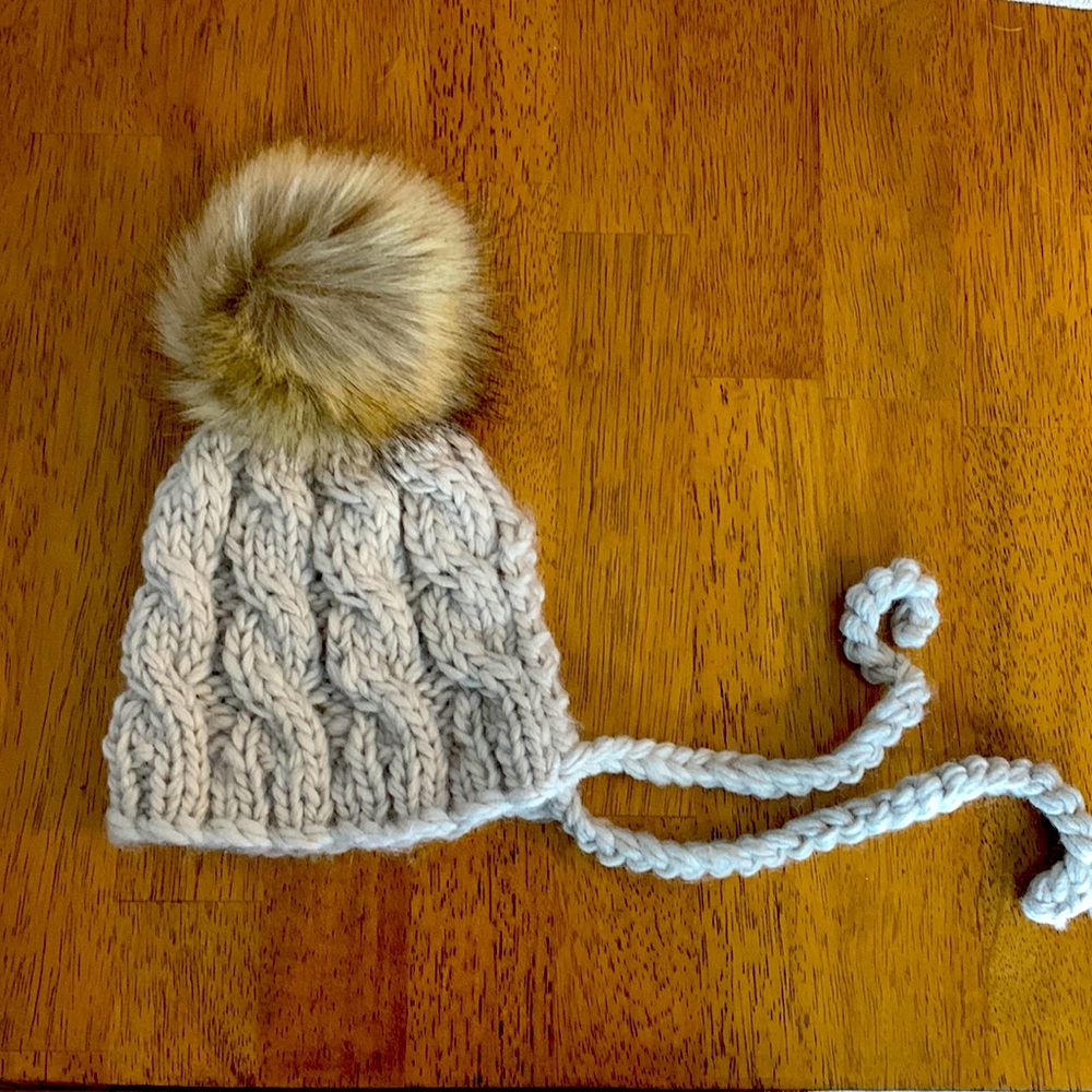 Brand new huggables knit hat in XS